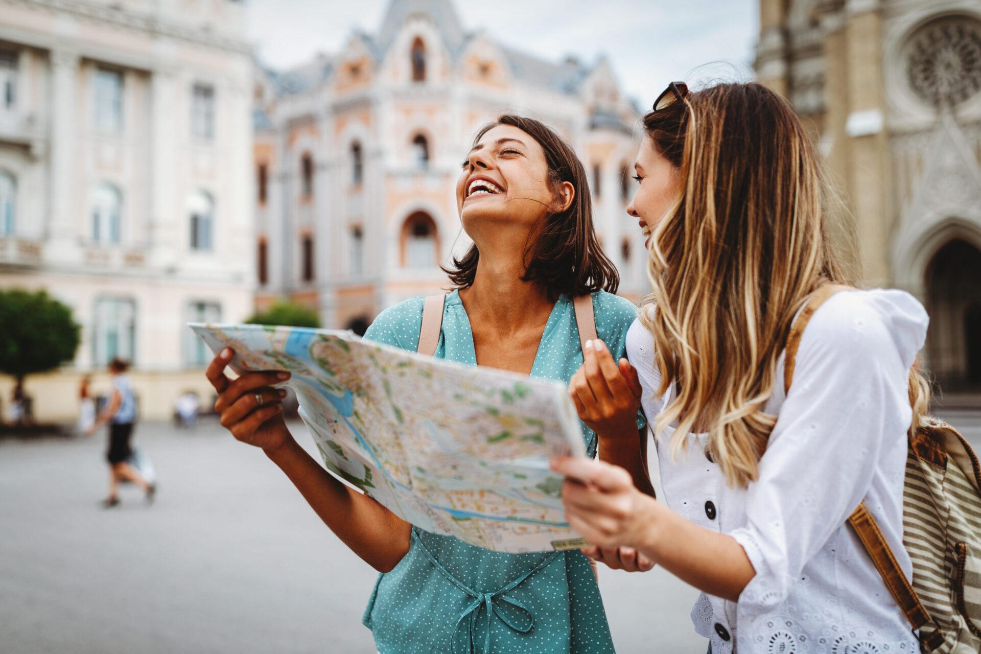 girls looking at the map